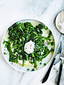 Grilled broccolini with peas, goat's curd and mint
