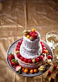 Tangy raspberry cheesecake with a decorative camembert tower