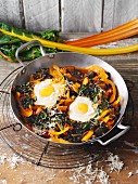 Eggs in a chard nest with parmesan