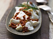 Marinated mozzarella with dried tomatoes