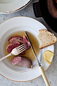 Sausage and beef with mustard and bread
