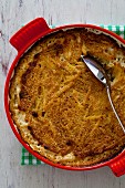 Traditional potato gratin with anchovies (Sweden)