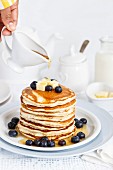 Pancakes served with Blueberries and Maple Syrup