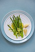 Green asparagus with garlic herb butter and lemon