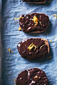 Dark chocolate and orange cookies on a baking tray