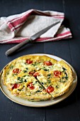 Frittata with spinach and cherry tomatoes