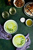 Cream of Potato Chive Soup with Chili Oil and Roasted Jalapeno. Served with bread and white wine