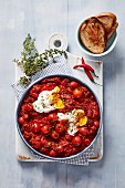 Shakshuka (poached eggs in a spicy tomato sauce)