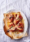 Bacon-wrapped chicken breasts with a gorgonzola filling