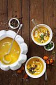 Pumpkin and turmeric soup with coconut, tofu and toasted pumpkin seeds
