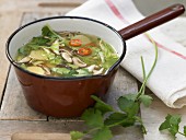 Asian cabbage soup with tofu, bamboo and shiitake mushrooms