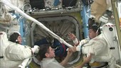 Suiting up for a spacewalk inside the ISS, timelapse