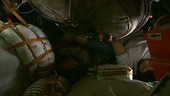 Working in a Soyuz capsule on the ISS