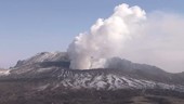 Steam rising from volcanic crater, Japan