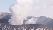 Steam rising from volcanic crater, Japan