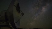 Star trails reflected in telescope dish