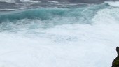 Typhoon waves hitting cliffs