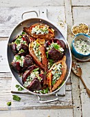 Oven-baked sweet potatoes and beetroot
