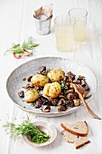 Boiled potatoes with roasted wild mushrooms