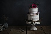 Homemade cake, flower decorated, on a stand
