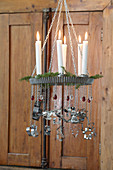 DIY chandelier made from cake tins and candles