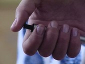 Insulin injector pen being used