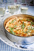 Salmon pie with rocket and white wine