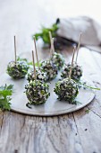 Soft cheese balls coated in herbs