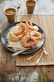 Prawns with dried coconut and wooden skewers