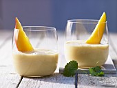 A mango and banana drink with orange juice and yoghurt