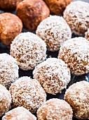 Homemade peanut butter energy protein balls with coconut flakes