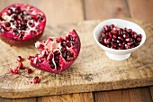 Pomegranate on Wooden Board