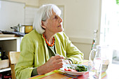 Elderly person eating