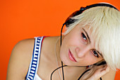 Teenager listening to music