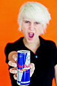 Teenager with energy drink