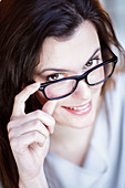 Woman wearing prescription glasses