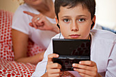 Boy playing videogames
