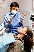 Dentist visiting woman