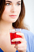 Woman drinking fruit juice