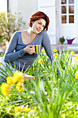 Woman drinking hot beverage