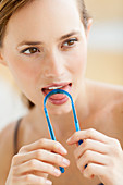 Woman brushing her tongue