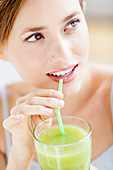 Woman drinking a smoothie