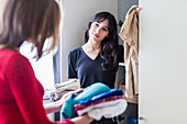 Women organizing clothes
