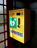 Community defibrillator in red telephone kiosk