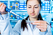 Girl using pipette