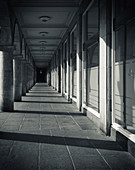 Walkway with pillars and shadows