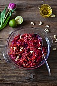 Raw carrot, apple, beetroot and red cabbage salad