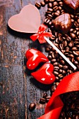 Coffee and chocolate on grunge wooden background