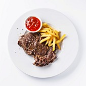 Roast beef with Salted french fries on white plate on white background