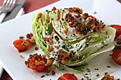 Wedge salad with bacon, blue cheese and cherry tomatoes